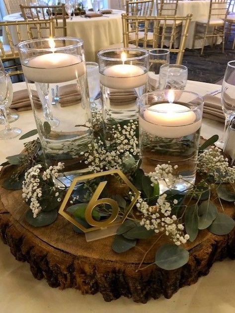 Creative Wedding Table Numbers, Wedding Table Number Ideas, Cylinder Centerpieces, Table Number Ideas, Water Centerpieces, Floating Candle Centerpieces Wedding, Number Ideas, Floating Candle Centerpieces, Greenery Centerpiece