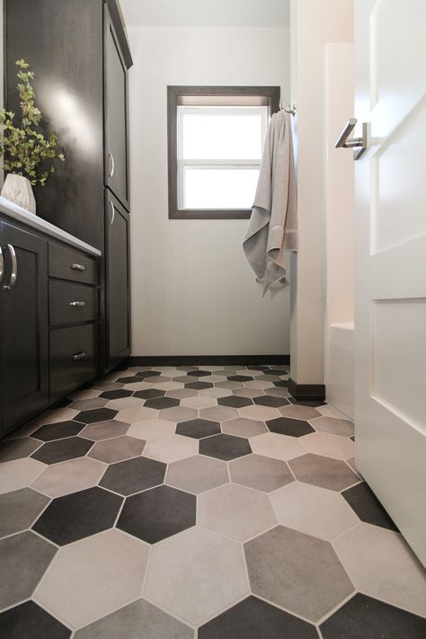 Main Bathroom with Grey, White, and Black Hexagonal Patterned Tile Flooring Black Hexagon Tile Bathroom Floor, Black And White Hexagon Tile Bathroom, Octagon Tile Bathroom, Black Bathroom Floor Tiles, White Hexagon Tile Bathroom, Hexagon Tile Bathroom Floor, Black Bathroom Floor, Black Tile Bathrooms, White Hexagon Tiles