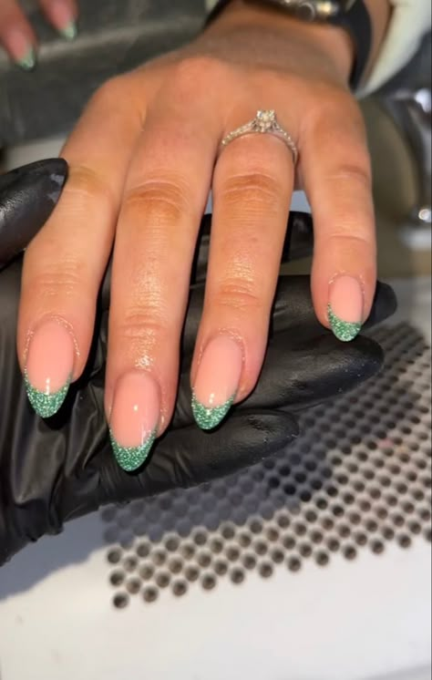 Simple Sparkly Nails Acrylic, Green Sparkle Tip Nails, Green Glitter French Tip Nails Almond, Green French Tip With Silver Line, Green Sparkly Tip Nails, Sparkle Nails Green, Sparkle Green French Tip Nails, Glitter Emerald Green Nails, Dark Green Nails For Homecoming