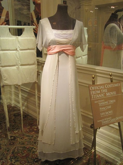 Kate Winslet's beautiful "sinking" dress on Titanic. This is on display at the exhibit in Pigeon Forge, TN. This was probably my favorite dress in the entire movie.  So pretty. Titanic Costume, Titanic Dress, 1910s Fashion, Titanic Movie, Pigeon Forge Tn, Edwardian Dress, Antique Dress, Movie Fashion, Vintage Gowns