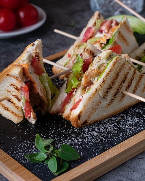 Four club sandwiches with letucce cherry... | Premium Photo #Freepik #photo #grilled-sandwich #cheese-sandwich #sandwich #club-sandwich Club Sandwich Photography, Sandwich Photography, Veg Sandwich, Sandwich Makers, Easy Recipes For Beginners, Food Menu Design, Vegetarian Sandwich, Club Sandwich, Grilled Sandwich