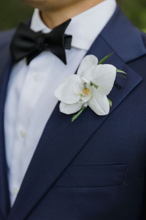 white orchid wedding florals, white orchid boutonnières, groom boutonnieres, groom boutonnierre ideas, wedding groom ideas Orchid Boutineer, White Orchid Boutonniere, Wedding Florals White, White Orchids Wedding, White Orchid Wedding, Orchid Boutonniere, Simple Wedding Bouquets, White Boutonniere, Reception Outfit