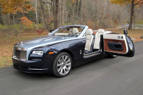 The 2016 Rolls-Royce Dawn convertible is both massive and massively luxurious. It’s the kind of car only Rolls could make. Carros Suv, Rolls Royce Dawn, Rolls Royce Motor Cars, Bmw Classic Cars, New Sports Cars, Pagani Huayra, Best Classic Cars, British Cars, Sports Cars Luxury