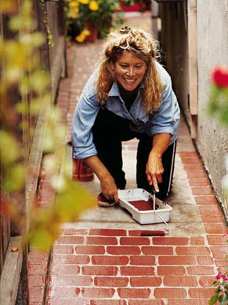 DIY: paint your own faux-brick sidewalk Brick Sidewalk, Door Basket, Cotton Wreath, Tees Design, Faux Brick, Brick Road, Painted Brick, Holiday Wreath, Logo Shirt