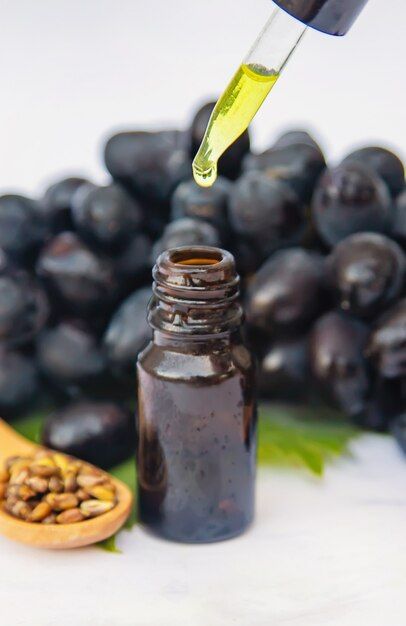 Grape Seed Oil, Small Bottles, Grapeseed Oil, Premium Photo, Seed Oil, Grapes, Seeds, Stock Photos