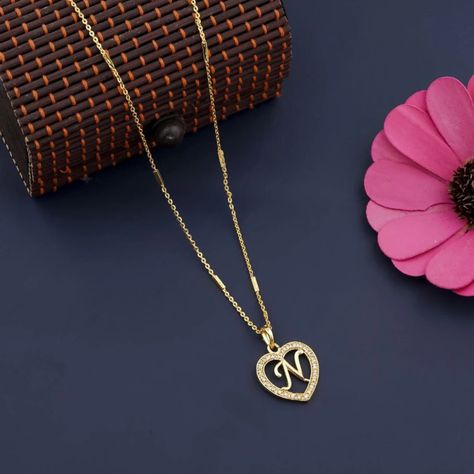 If your name starts with the alphabet n, then choose a locket or pendant with the alphabet n to create your unique style. Available in gold, silver and platinum. N Alphabet, Alphabet N, Alphabet Pendant, Pendant With Chain, Traditional Modern, Letter Pendants, Pendant Gold, The Alphabet, Chain Pendants