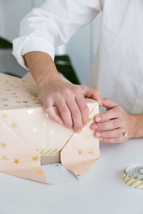 A step-by-step guide to wrapping the perfect present How To Wrap A Gift Step By Step, How To Wrap A Present Step By Step, Stacked Gift Wrapping, How To Perfectly Wrap A Present, Gift Wrapping Step By Step, Wrapping A Present, How To Wrap A Box Gift, Present Wrapping Tutorial, How To Wrap A Present