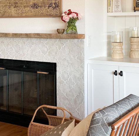 Design inspo: Cool fireplaces to keep you warm this winter | Style Curator Timeless Fireplace Tile, Decorative Tile Fireplace, Moroccan Tile Fireplace Surround, Neutral Tile Fireplace, Fireplace Mosaic Tile Ideas, Ceramic Tile Around Fireplace, Zellige Tile Fireplace Surround, Pattern Tile Fireplace, Fireplace Tile Makeover