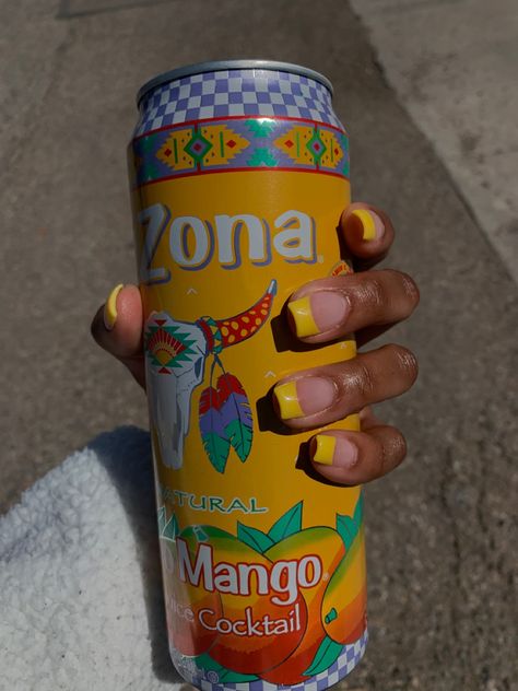 A hand with short yellow french tip nails holding an Arizona Much Mango juice cocktail Mango Yellow Nails, Mucho Mango Arizona, Arizona Bebida, Yellow French Tip Nails, Mango Nails, Yellow French Tip, Sadie Core, 2025 Summer, Yellow French