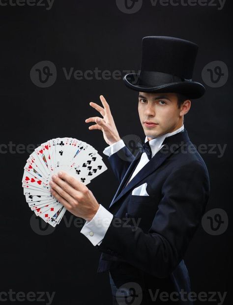 magician showing trick with playing cards Person Holding Playing Cards Reference, Pose Reference Cards, Magician Reference, Holding Cards Reference, Magician Pose Reference, Magician Pose, Magician Man, Halloween Poses, Magician Costume