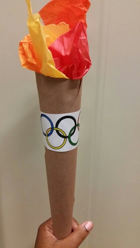 Olympic torch craft Torch Craft, Olympic Torch Craft, Vbs Olympics, Preschool Olympics, Office Olympics, Olympic Theme Party, Olympic Idea, Olympic Crafts, Beer Olympic