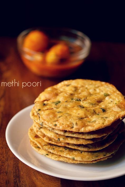 methi puri recipe with step by step photos. crisp, tasty and spiced pooris made with fenugreek leaves. these methi puris can be made and stored in an air-tight jar. you can also make this methi poori recipe with dry fenugreek leaves or kasuri methi. Methi Puri Recipe, Easy Indian Appetizers, Methi Recipes, Puri Recipe, Puri Recipes, Breakfast Recipes Indian, Fenugreek Leaves, Diwali Food, Indian Bread