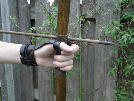 Join the FOTW Realm and get an instant 10% off code! http://eepurl.com/hrobtv Shoot confidently and comfortably off you hand with one of our bow gloves! Meant to be worn on the hand that holds the bow, to protect from sharp arrow fletching going across top of hand as you shoot. Choose the hand you'll wear it on at checkout. Handmade with quality cowhide leather. Makes a nice addition to a Medieval Archer costume, or for everyday archery use! Easy to put on, just slip your thumb and forefinger in Medieval Ranger, Archer Costume, Robin Hood Hat, Medieval Archer, Archery Gloves, Arrow Fletching, Archery Accessories, Costume Gloves, Archery Bow