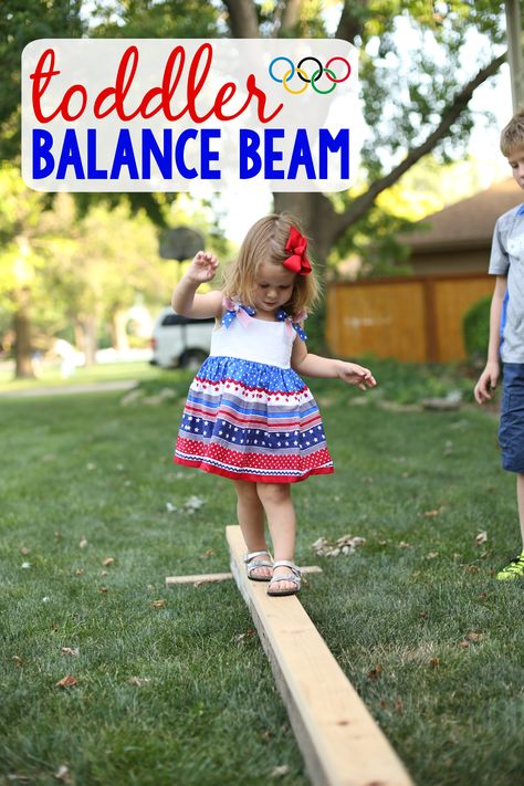 A simple balance beam that encourages balance and self-regulating movements in toddlers! Toddler Balance Beam, Balance Beam Activities, Diy Balance Beam, Physical Activities For Toddlers, Backyard Kids, Toddler Sports, Backyard Kids Play Area, Toddler Outdoor, Gross Motor Activities