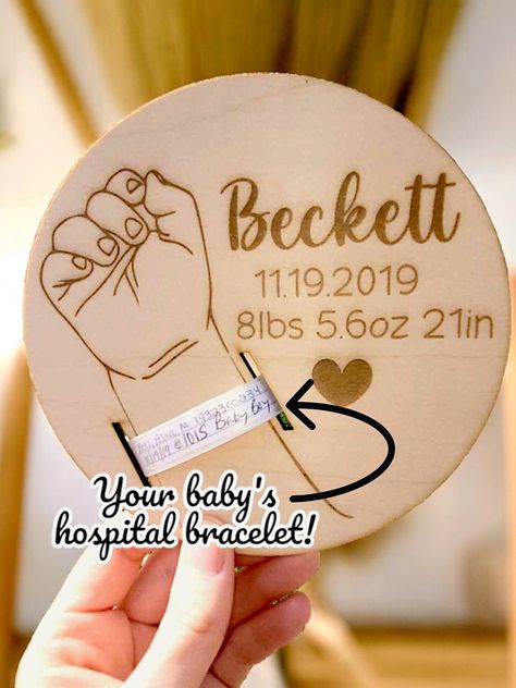 This beautifully engraved wooden disk holds your precious baby's hospital bracelet and is a timeless keepsake piece.  Name and stats are customizable making this the perfect gift for new parents or Mother's Day!   Details: *Nearly 6 inches in circumference, perfect for a small display on your mantle or to hang up (recommend command strips, hanging hardware is not included) *Openings cut out for bracelet display Each detail is perfectly engraved with a laser, but please note that wood pieces may vary in color and given the nature of wood there may be knots or other interesting patterns within the wood.  Every piece is inspected to ensure quality, but please reach out if you have any questions or issues.  Due to the nature of custom made items, please note that we cannot accept returns or re Laser Engraved Baby Gifts, Hand Engraving Ideas, Laser Cut Gift Ideas, Engraved Baby Gifts, Hospital Bracelet, Wood Engraved Gifts, Acrylic Items, Wood Laser Ideas, Glowforge Ideas