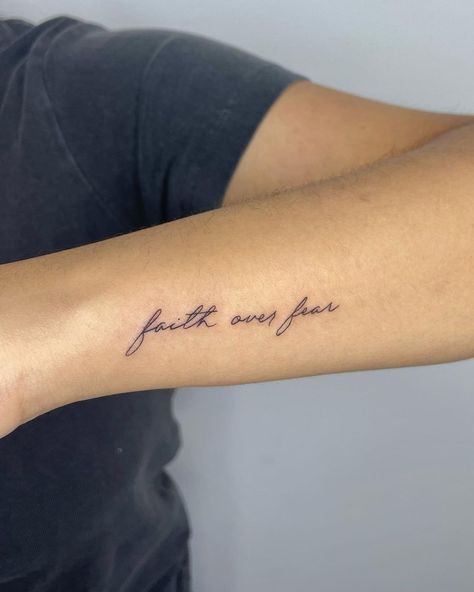 Strength From Love Tattoo, Strong Minded Tattoo Ideas, Word Line Tattoo, Faith Over Fear Wrist Tattoo, Tattoos For Daughters Meaningful, Arm Tattoo Ideas Black Women, God Fine Line Tattoo, Fear Over Faith, Tattoos Ideas For Moms