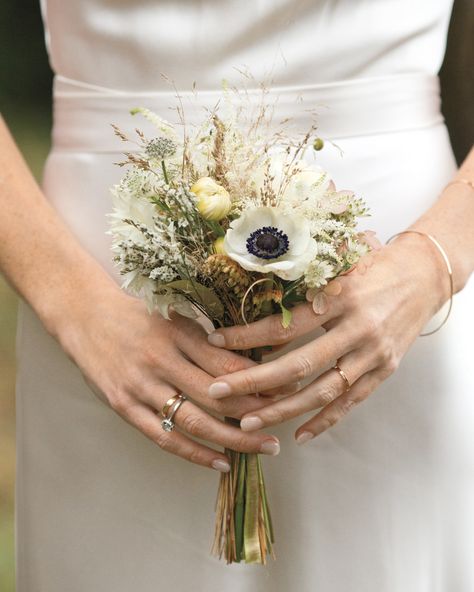 This bouquet, by Krishana Collins of Tea Lane Farm, included local blooms from around the Martha's Vineyard venue like calcynias, panda anemones, dahlias, and native field grasses. Small Bridal Bouquets, Small Wedding Bouquets, Anemone Bouquet, Simple Wedding Bouquets, Tiny Wedding, Bridal Bouquet Fall, Beach Wedding Flowers, White Bridal Bouquet, Fall Wedding Bouquets