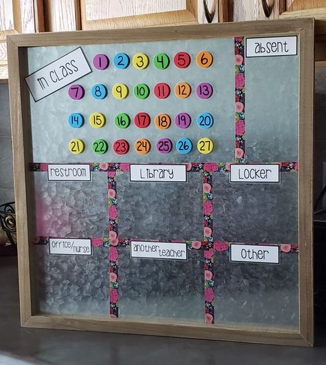 DIY classroom sign out system using Hobby Lobby magnetic board, Washi tape, foam discs, and small magnets. Font on labels is "hellobarnyard". Love this easy system that allows me to keep track of my kiddos and matches my class decor! Attendance Magnet Board, Magnetic Attendance Board, Over The Board Classroom Decor, Classroom Sign Out Board, Classroom Attendance Board Ideas, 3 Drawer Plastic Storage Classroom, Classroom Sign Out System, Hobby Lobby Classroom Decor, Classroom Attendance Ideas