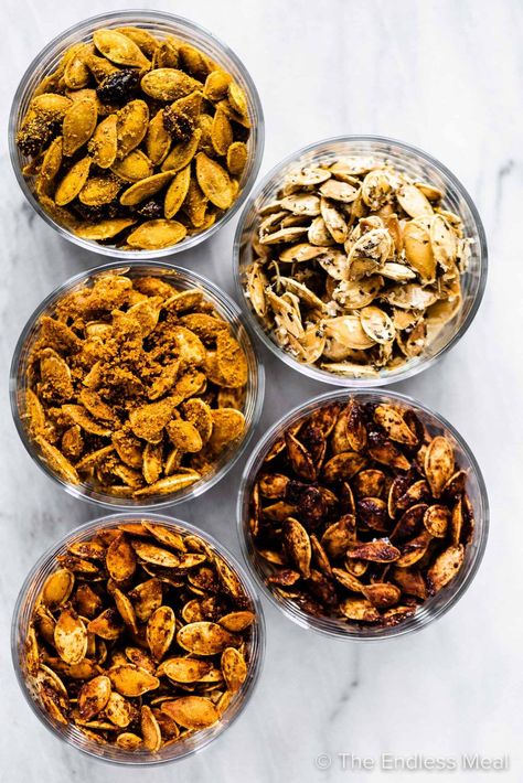 PIN TO SAVE FOR LATER! Roasted pumpkin seeds are the best part about carving a pumpkin. Cooking pumpkin seeds is incredibly easy and they turn out crispy and delicious every time with our recipe. Bonus: we share our 5 favorite pumpkin seed seasonings! #theendlessmeal #pumpkinseeds #pumpkin #roastedpumpkinseeds #bakedpumpkinseeds #carvingapumpkin #healthysnack #snacks #snackrecipes #pumpkinrecipes #fall #fallsnack #halloween #halloweenrecipe #healthyhalloween Pumpkin Cooking, Cooking Pumpkin Seeds, Carving A Pumpkin, Pumpkin Seed Recipes, Cooking Pumpkin, Seasonal Salad, Baked Roast, Fall Snacks, Roasted Pumpkin