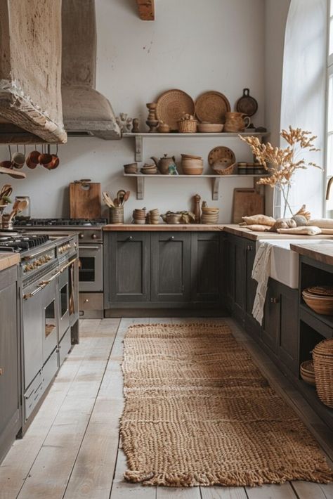 Earthy Textures in a Scandi Boho Kitchen use a palette inspired by nature, incorporating browns, greens, and beiges. Textural diversity featuring jute, linen, and clay adds depth and interest to the clean lines of Scandinavian design, creating a warm, inviting space. Click for more ideas on using natural tones and textures. Scandi Boho Kitchen, Cozy Kitchen Nook, Earthy Kitchen, Boho Kitchen Ideas, Earthy Textures, Comfortable Kitchen, Scandi Boho, Eclectic Kitchen, Rustic Farmhouse Kitchen