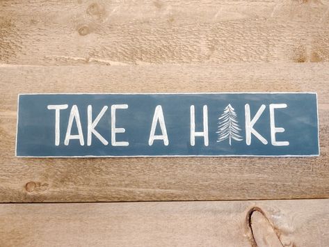 Handpainted wooden hiking sign in weathered navy blue with metallic silver lettering. Perfect gift for your favorite hiker! Take A Hike Sign, Painted Pinecones, Rustic Valentine, Hiker Gifts, Material Wreaths, Barn Wood Signs, Small Wall Art, Daisy Painting, Desk Sign