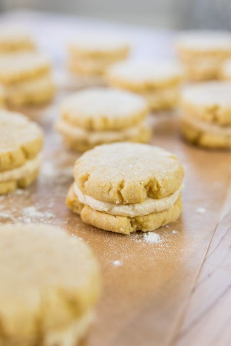 Bringing cornmeal into cookies means gaining an incredible crunch. Combined with the sweetness of honey, and creaminess of buttercream, this cookie strikes an amazing balance. | wyseguide.com #cornmealcookies #honeycookies #honeyandcornmeal #homemadecookies Cookie Of The Month, Cornmeal Cookies, Cornmeal Recipes, Honey Cookies, Buttercream Filling, Bakery Recipes, Cookie Ideas, Homemade Cookies, Sandwich Cookies