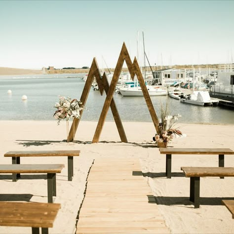 Mountain Wedding Arch, Mountain Arch, Mountain Theme Wedding, Daughters Of Simone, Wooden Wedding Arches, Colorado Lakes, Lake Wedding Venues, Wedding Aisle Outdoor, Pelican Bay