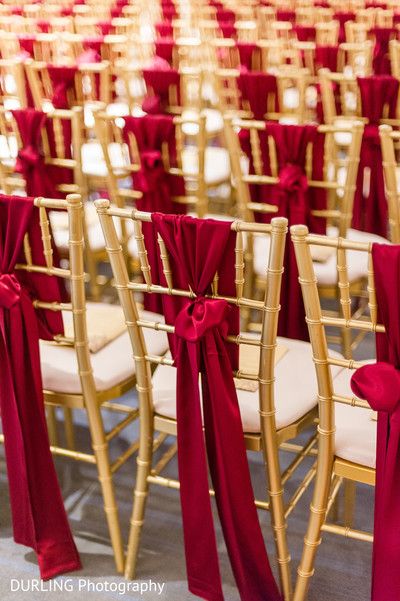 Indian wedding ceremony tastefully decorated. https://www.maharaniweddings.com/gallery/photo/143029 Red Chair Decor, Red Indian Wedding Decor, Red Wedding Flowers Bouquet, Red Indian Wedding, Wedding Ceremony Chairs, Indian Wedding Flowers, Brides Indian, Ceremony Chairs, Red Wedding Flowers