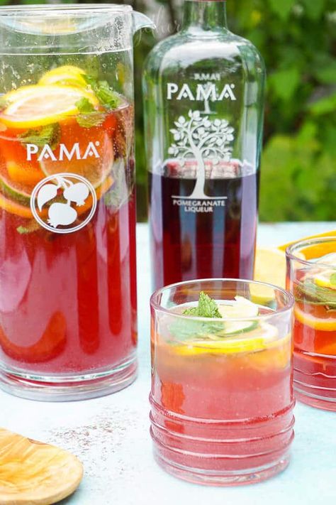 Celebrate summer with this Pomegranate Citrus Rum Punch! Sweet PAMA Pomegranate Liqueur paired with lemonade, lemon lime soda, and rum for a splash of summer fun. Plus a recipe video! Alcoholic Drink Recipes, Pomegranate Liqueur, Pomegranate Margarita, Citrus Punch, Rum Punch Recipes, Mommy Juice, Pomegranate Recipes, Summer Drinks Alcohol, Liquor Recipes