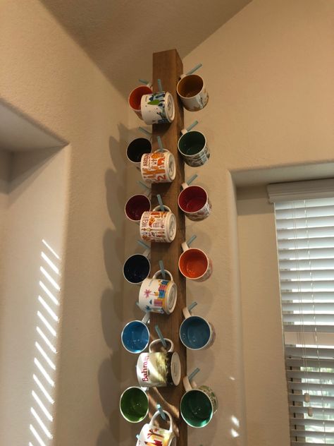 Coffee mug rack. Built with a 4x4x8’ cedar post eith dowl rods and a stand. Mug Display Ideas Craft Show, Coffee Mug Rack, Cedar Posts, Mug Display, Mug Tree, Diy Mugs, Mug Rack, A Stand, Wind Chimes