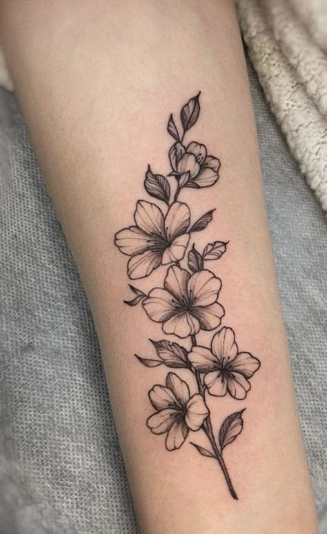 Group Of Flowers Tattoo, Larkspur Flower Tattoo Design, Cherry Blossom Forearm Tattoo, Floral Tattoo Design Forearm, Larkspur Tattoo Design, Simple Arm Tattoos For Women, Delphinium Flower Tattoo, Flower Tattoo Forearm, Cherry Blossom Tattoo Design