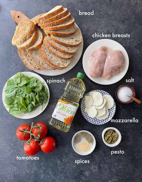 This is the best chicken pesto sandwich recipe! Perfect for dinner or lunch on-the-go, you only need a few ingredients and 20 minutes to make this delicious sandwich. Chicken pesto sandwiches are well-received by almost everyone. Whether you're serving them at a family gathering, picnic, or lunch with friends, they are likely to be enjoyed by all. Chicken Pesto Sandwich Recipe, Pesto Chicken Sandwich, Pesto Sandwich Recipe, Cheesy Pesto Bread, Chicken Pesto Sandwich, Sandwich Chicken, Pesto Bread, Pesto Sandwich, Pesto Salmon