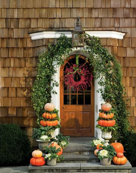 21 Creative Pumpkin Decorating Ideas For Your Front Porch Outside Fall Decorations, Creative Pumpkin Decorating, Fall Front Porch Ideas, Pumpkin Planter, Fall Containers, Pumpkin Display, Pumpkin Topiary, Creative Pumpkins, Stacked Pumpkins