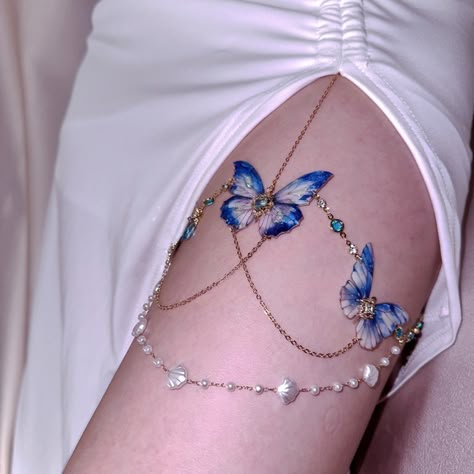 Take your style to new depths with our Atlantis Butterfly Blue Thigh Chain. This unique accessory adds a touch of mystery to any outfit with its stunning blue design. Elevate your look and stand out with this one-of-a-kind Thigh chain. 🦋More Grape JiangNan Product👈 Product DetailMaterial: CopperingElastic Strap (Perimeter): 46~54cmTech: HandmadeStyle: ChicOccasion: Bar/Party/Weekend Casual/Going Out Product Note: 1. All pictures are taken in real-life scenarios, and color variations may exist Thigh Chain Jewelry, Thigh Jewelry, Butterfly Legs, Thigh Chain, Butterfly Blue, Leg Chain, Bar Party, Magical Jewelry, Girly Accessories