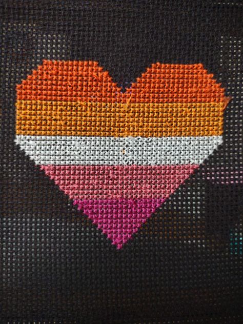 Pattern for a cross stitch lesbian pride flag heart DMC colors used from top to bottom: 900 3853 White 3731 917 Lesbian Cross Stitch, Lesbian Pride Flag, Lesbian Flag, Cross Stitch Heart, Stitch Ideas, Cross Stitches, Pride Flag, Top To Bottom, A Cross