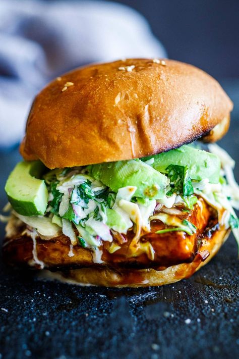 Crispy BBQ Tofu Sandwich topped with cool, creamy cilantro cabbage slaw and avocado, that can be made in under 30 minutes. Vegan! Bbq Tofu Sandwich, Feasting At Home, Tofu Burger, Tofu Sandwich, Bbq Tofu, Vegetarian Barbecue, Bbq Sandwich, Crispy Tofu, Cabbage Slaw