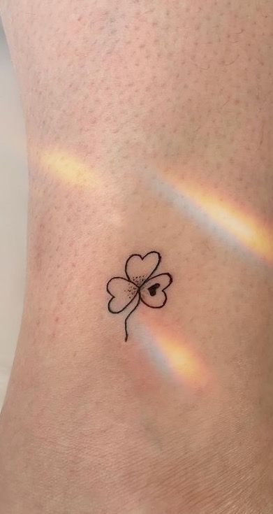 Shamrock Wrist Tattoos For Women, Tiny Irish Tattoos For Women, Shamrock Wrist Tattoo, Shamrock Finger Tattoo, Small Lucky Tattoos, Clover Ankle Tattoo, Fine Line Shamrock Tattoo, Tattoo Ideas Irish, Shamrock Tattoo For Women