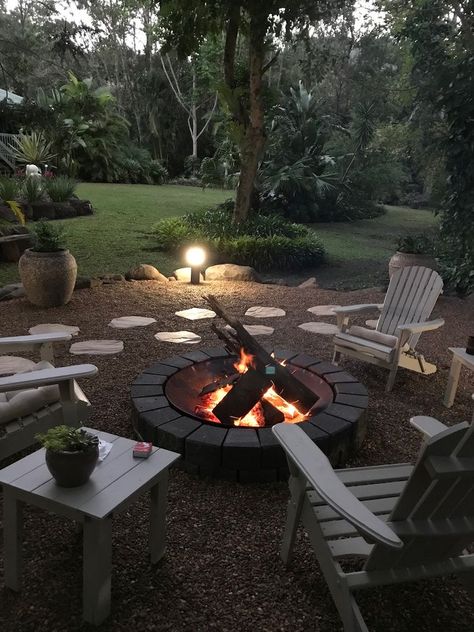 Walking Path To Fire Pit, Black Fire Pit Ideas Backyard, Woodsy Fire Pit Area, Fire Pit Area Ideas Backyard On A Budget, Tropical Fire Pit, Firepits Backyard Ideas Landscapes, Small Yard Fire Pit Ideas, Fire Pit Area Ideas Backyard, Pea Gravel Fire Pit Area