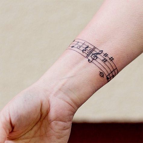 Music Staff Tattoo, Sheet Music Tattoo, Wrist Band Tattoo, Wrist Bracelet Tattoo, Music Tattoo Sleeves, Music Notes Tattoo, Armband Tattoo Design, Graffiti Tattoo, Music Tattoo Designs