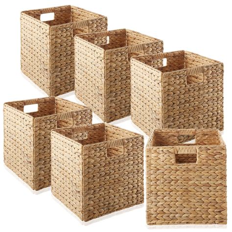 PRICES MAY VARY. Set of 6 storage cubes: Includes six water hyacinth folding storage cube baskets. Each cube measures 12" W x 12" D x 12" H and is designed to fit most cube storage shelving units and cubby organizers. These storage baskets feature a sturdy metal frame and are built to last. Due to the handmade nature of these products, each piece is unique; please allow for slight variation in measurements. Handwoven baskets: Water hyacinth storage cubes, or utility baskets, offer a stylish and eco-friendly solution to your storage needs. They are handwoven with natural and sustainable water hyacinth, making them durable and environmentally friendly. Instant storage solution: Unlike other storage solutions that require assembly, these storage bins arrive ready to use. To use, gently unfold Cube Organizer Bins, Cube Shelving Unit, Laundry Pantry, Cubby Organizer, Pantry Shelves, Bedroom Laundry, Laundry Basket Organization, Storage Cubes, Cube Organizer