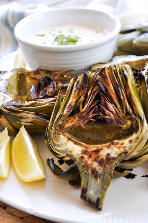 Grilled Artichokes with Zesty Garlic Aioli Vegetarian Starter Recipes, Roasted Artichokes, Garlic Aioli Recipe, Vegetarian Starters, Grilled Artichoke, Roasted Artichoke, Aioli Recipe, Garlic Dip, Artichoke Recipes