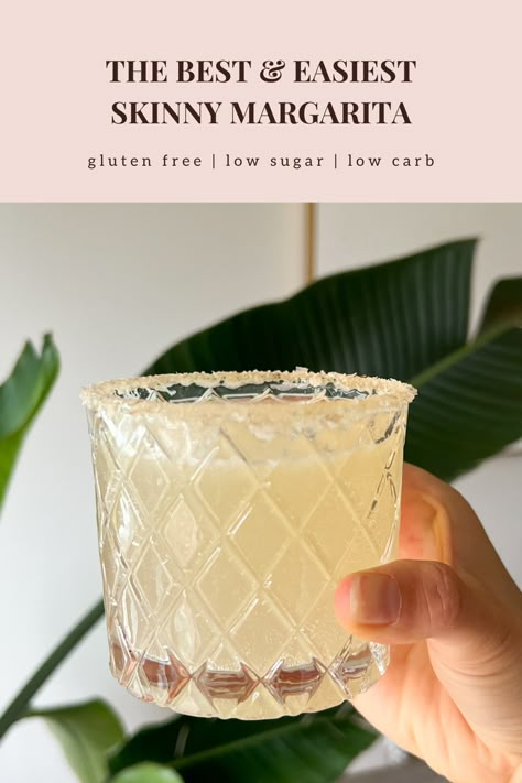 This healthy skinny margarita is the best, easiest, low sugar, low carb, and clean eating. In a clear cocktail glass with a diamond pattern is a light yellow cocktail with bubbles from the added soda. The rim of the glass is covered in thick flakey sea salt. The background is a giant green palm plant leaf. No Sugar Margarita Recipe, Weight Watcher Margarita, Healthy Margarita Pizza, Low Sugar Margarita Recipe, Low Cal Margarita Recipe, Different Drinks, Sugar Twist, Perfect Summer Drink, Classic Margarita