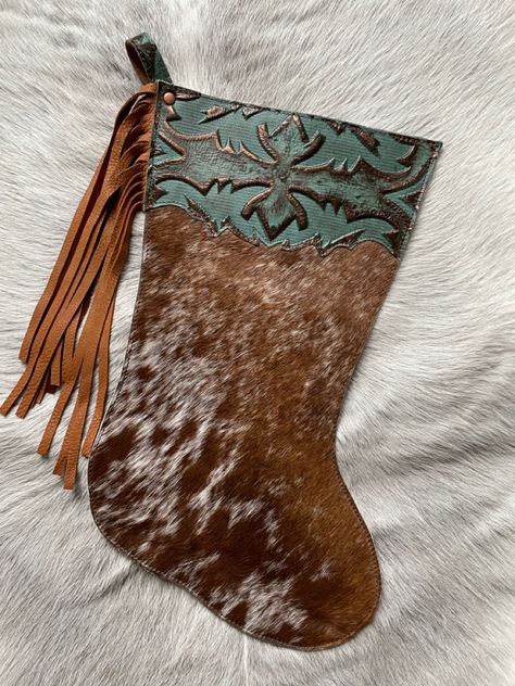 Cowhide and leather stockings Cowhide Stocking, Stockings Diy, Christmas Stockings Diy, Cowboy Gear, Leather Ideas, Cowboy Christmas, Design Christmas, Handmade Holiday, Leather Projects