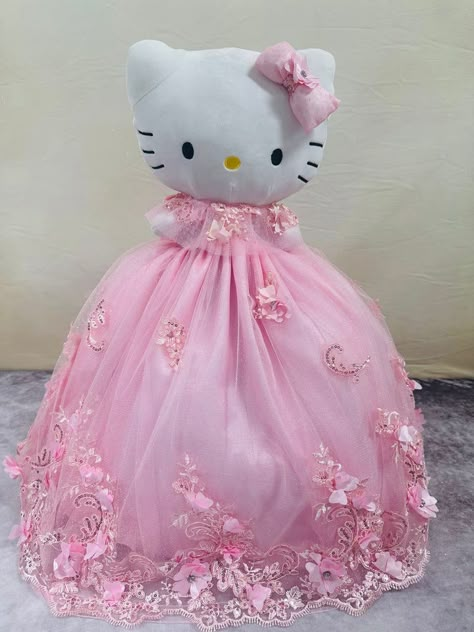 Pink Hello Kitty Quinceanera Dresses, Pink And Gold Quinceanera Theme, Hello Kitty Quinceanera Theme, Xv Themes, Hello Kitty Quince, Pink Floral Quince Dress, Hello Kitty Quinceanera Doll, Quince Recuerdos Ideas, Quinceanera Ideas Pink