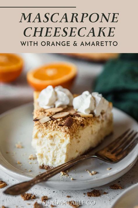 This mascarpone cheesecake with orange zest, amaretto, and almond cookie crust is a decadent twist on a classic dessert! This baked cheesecake is more creamy and less tangy than the usual cream cheese version. And, the orange and almond flavors perfectly compliment the richness of the mascarpone filling. Even better, there's NO water bath! The recipe is simple and make-ahead for an easy holiday dessert. It's one of my go-to dessert recipes for Christmas, Thanksgiving, or any special event! Ny Cheesecake Recipe, Dessert Recipes For Christmas, Italian Cheesecake, Mascarpone Cheesecake, Easy Holiday Dessert, Mascarpone Filling, Recipes For Christmas, Almond Cookie, Baked Cheesecake