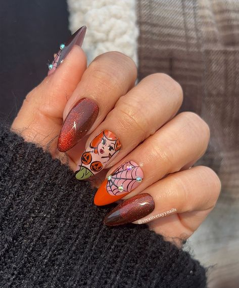 My Halloween set for 2024 is this spooky gal!! I loved creating her and using these orange hues 🧡🕸️🎃 The gem web was IB @nail_lux_bygiu & pumpkin girly by @thevintagepal I saw her art on Pinterest Products used: @apresnailofficial medium almond & Autumn Apricot gel, @nailzbydevshop house of horrors cat eye gel & baddest black gel liner #halloweennails #halloweennailart #spookynails #spookynailart #pumpkinnails #velvetnails #characternails #nailinspo #nailartist House Of Horrors, Velvet Nails, Pumpkin Nails, Medium Almond, Orange Hues, Cat Eye Gel, Horror House, Gel Liner, Halloween Nail Art