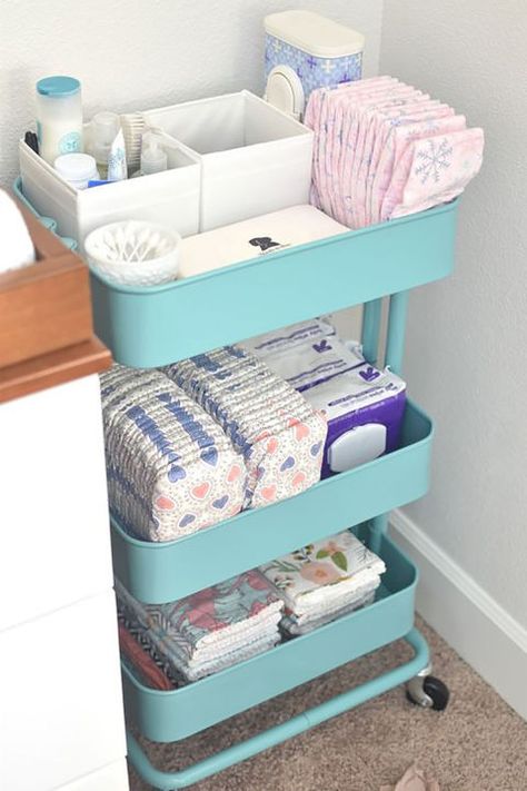 Diaper-changing station: wipes, diapers, and toiletries, and burp cloths easily accessible. Raskog Ikea, Perlengkapan Bayi Diy, Diaper Station, Pregnant Tips, Ikea Raskog, Kura Bed, Diaper Changing Station, Baby Storage, Nursery Organization