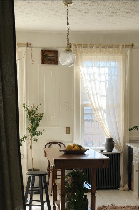 a dining room table with a bowl of fruit on it and long sheers on windows Kitchen Window Shades, Big Bathroom Design, Kitchen Curtain Ideas, Dining Room Styling, Kitchen Paint Color, Simple Window Treatments, Colorful Backsplash, Bold Kitchen, Kitchen Addition