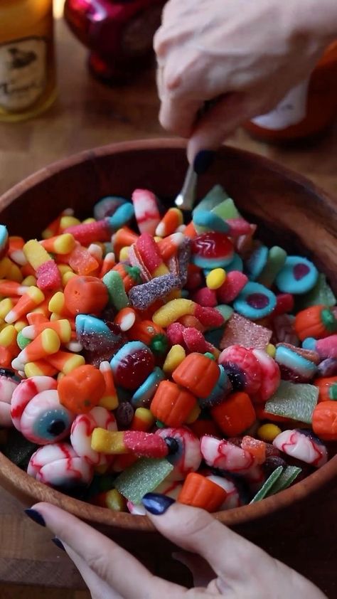 Halloween Candy Salad 🎃 is the perfect easy treat for a spooky party! I used a combination of mellow-crème pumpkins, sour brite worms, gummy brains, zombie sour patch kids, sour skittles, sour belts, candy corn, and gummy eyeballs- most which I found of at Target. #halloweenfood #halloweendesserts #halloweeninspo #halloweeninspiration #spookytreats #spookyszn #halloween #halloweendecor #candysalad #halloweencandy #baking #bake #cakedecorating #baker #halloweenbaking #halloweenideas | Sheri B Gummy Worms Halloween, Halloween Gummy Worms, Fall Candy Salad, Candy Shoot For Halloween, Monster Mash Party Food, Creepy Halloween Snacks, Halloween Candy Salad, Halloween Snacks For Kids School, Sour Belts Candy