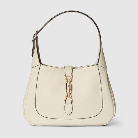 Shop the Gucci Jackie 1961 small shoulder bag in white at GUCCI.COM. Enjoy Free Shipping and Complimentary Gift Wrapping. Gucci Jackie 1961 Mini, Jackie 1961 Small Shoulder Bag, Gucci Jackie 1961, Red Web, Zip Puller, Crescent Shape, Gucci Shoulder Bag, Iconic Design, Gucci Wallet